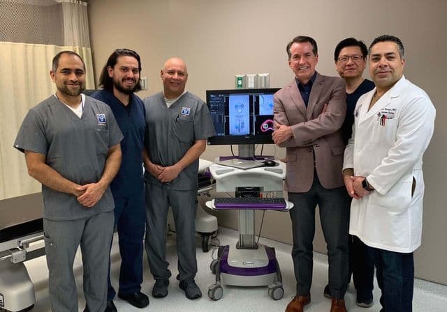 The Urology Place team with the Navigo fusion biopsy system